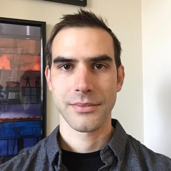 Khaled Allen with artwork in background