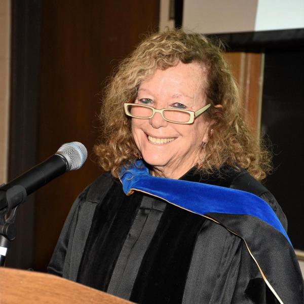 Professor Janet Jacobs, Director of Honors Program, announces Latin honors designations