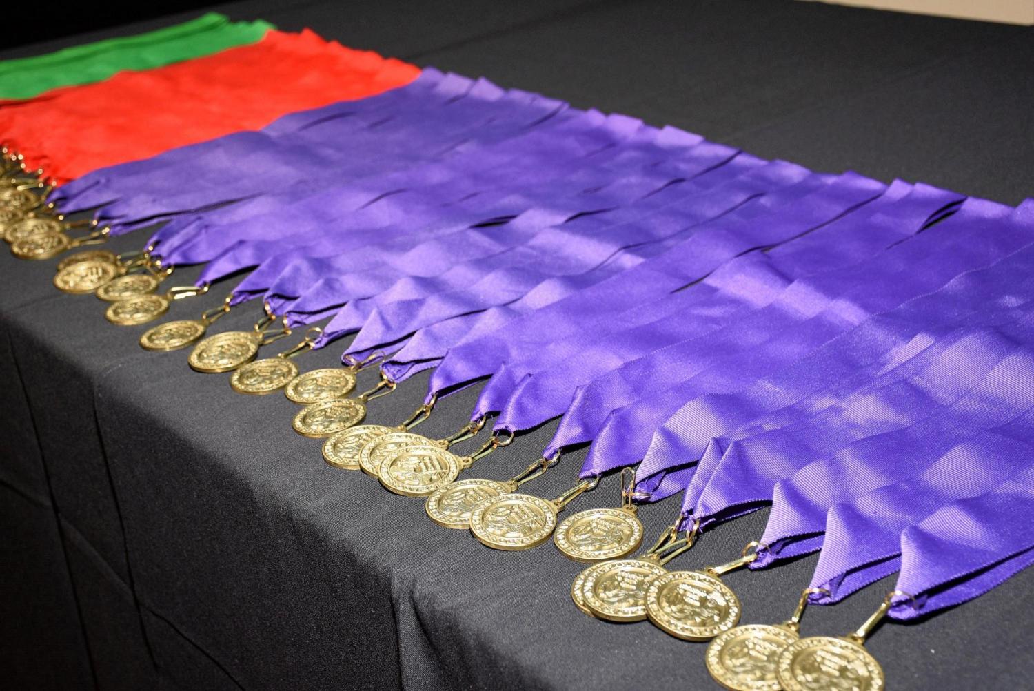 Latin honors medals lined up