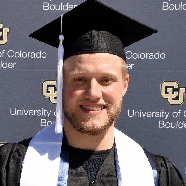 Olav Rohnebak stands in front of a "University of Colorado Boulder" background.