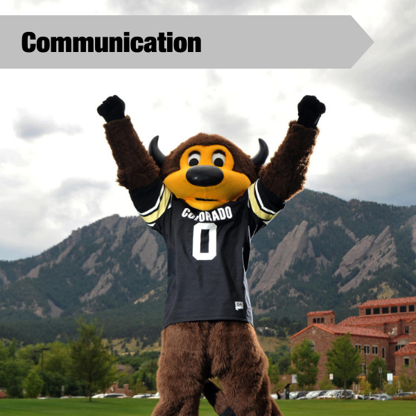 communication tile with Chip standing in front of the flatirons