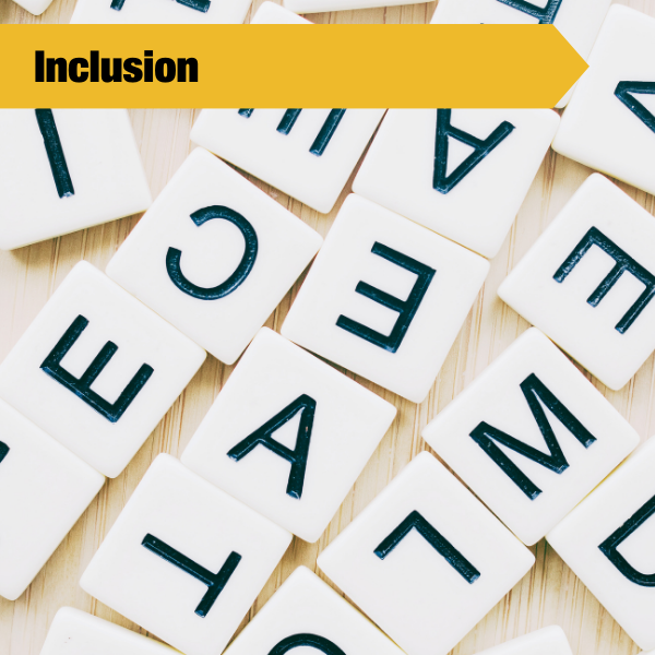 inclusion tile with letter tiles scattered in the photo