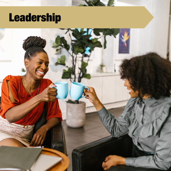 leadership tile with two people talking with mugs in their hands