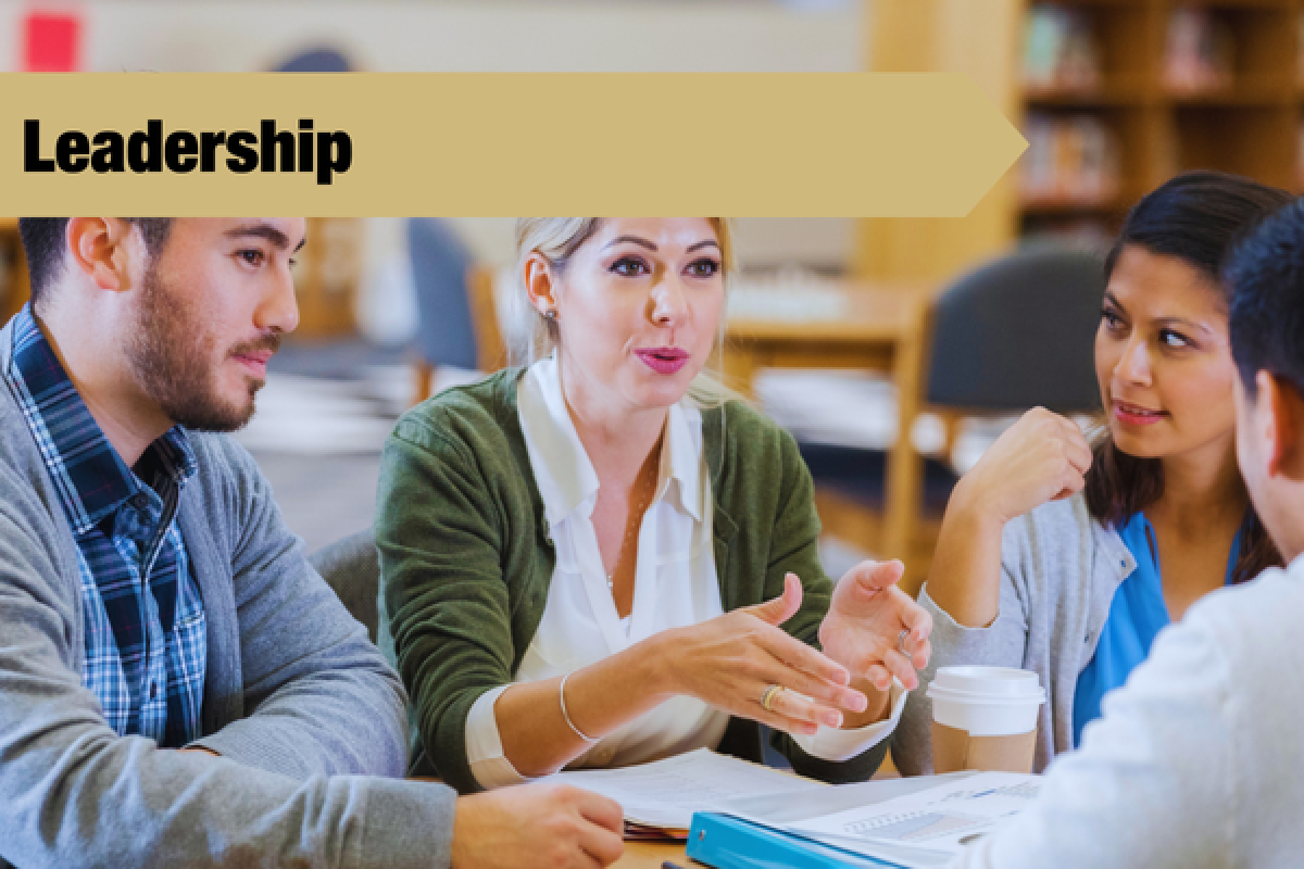 4 people in a conversation with leadership banner