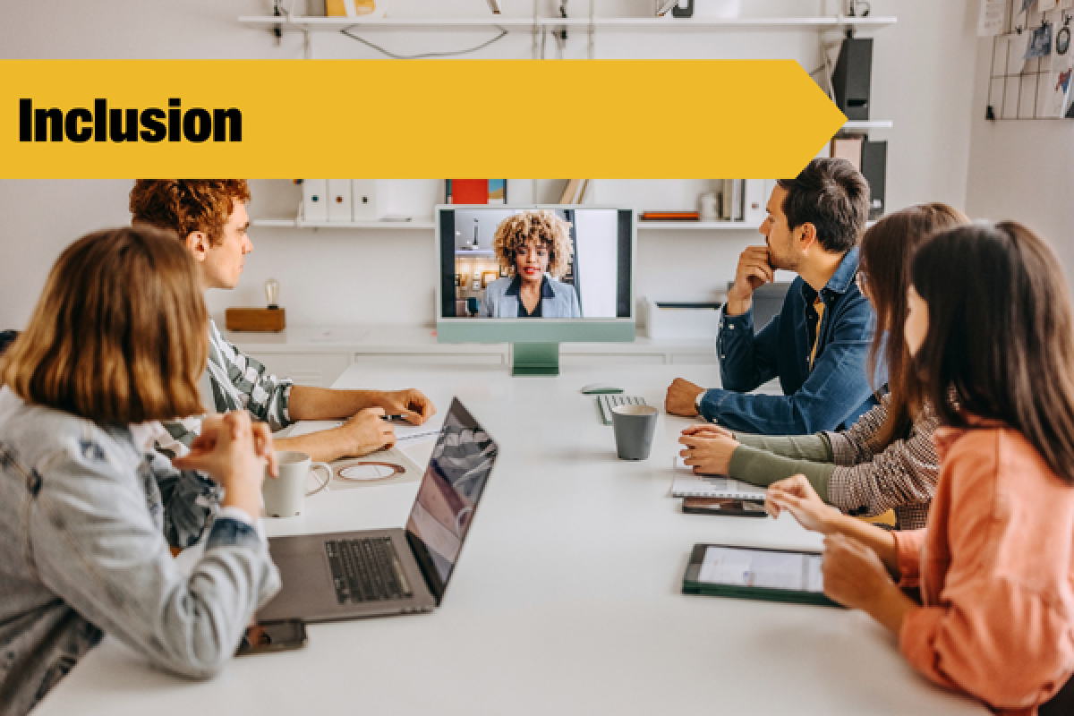 people in a hybrid meeting with inclusion banner