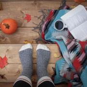 Thick socks, book and coffee cup