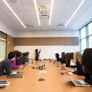 colleagues in a meeting, photo from unsplash