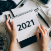 hands holding 2021 calendar