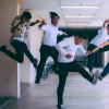 Group of employees jumping up