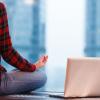 Person doing yoga at home
