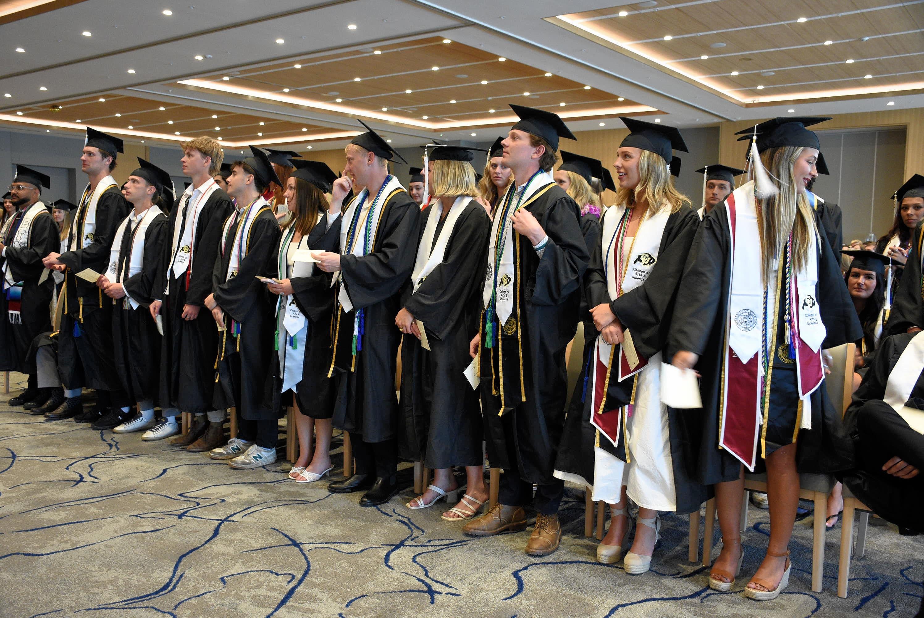 Graduates Standing during Ceremony