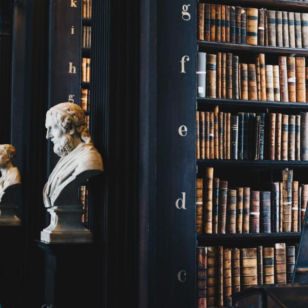 statue with books