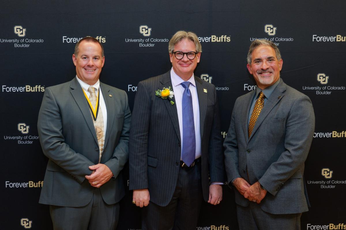 three men in suits