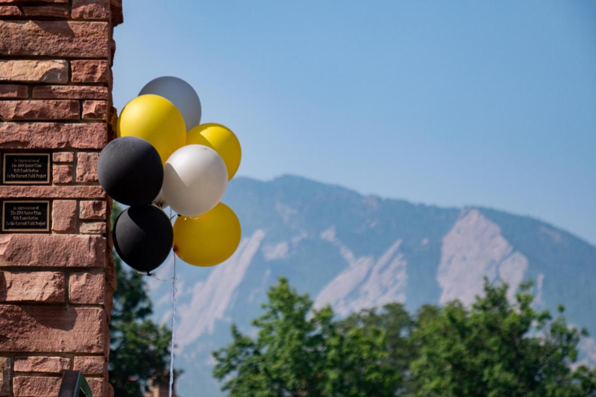 Balloons adorn the entrance to Farrand Field for the 2018 Finding Your Fit event for new students. (Photo by Glenn Asakawa/University of Colorado)