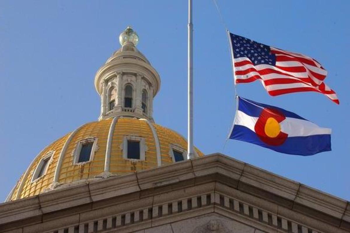 denver capitol with us and colorado flag