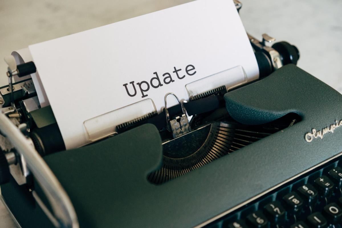 typewriter that has Update on a piece of paper.