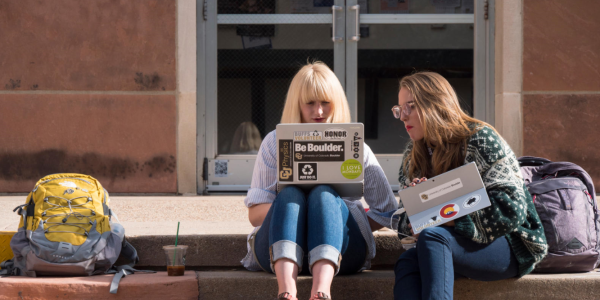 Mary Taggart, a freshman physics major from McKinney, TX, left, and Jessie Pafford, and freshman integrated physiology major from Sanford, NC, study outside of Chem 140. on Nov. 15, 2017. (Photo by Glenn Asakawa/University of Colorado)