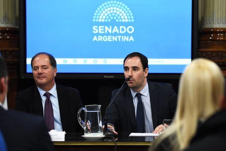 tom talking with a senator at argentine senate