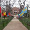 cu boulder campus sidewalk with a variety of national flags
