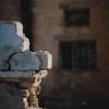 partially destroyed stone building or wall.