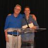 Spencer Huggett accepts the award from Eric Turkheimer