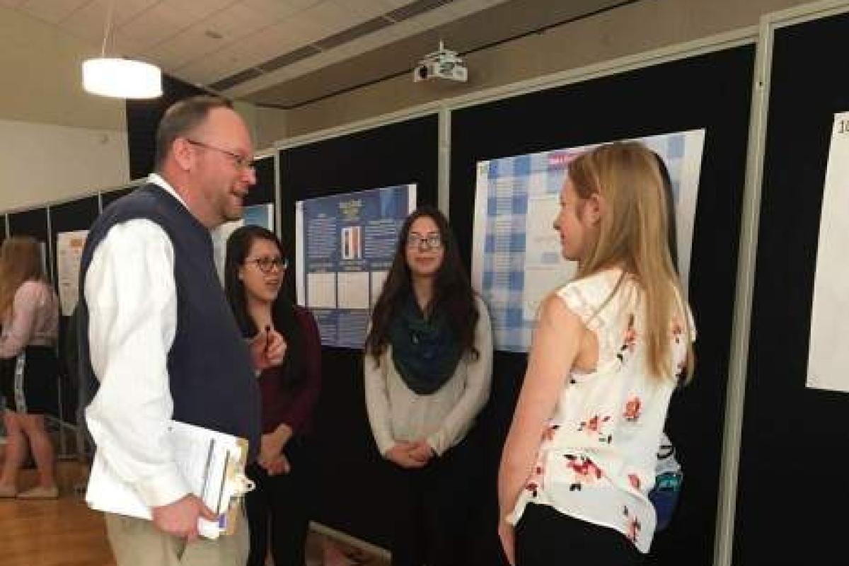 High school students at an air quality symposium
