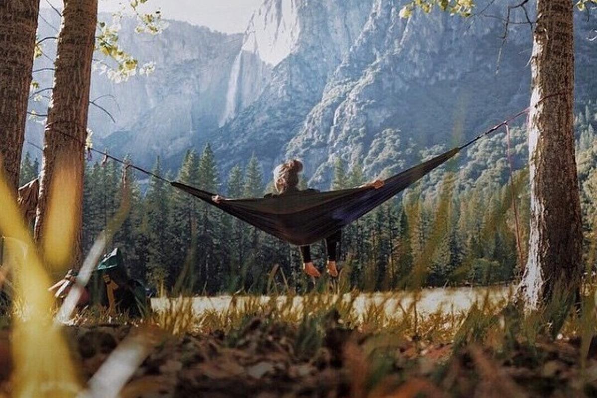 woman sitting in hammock