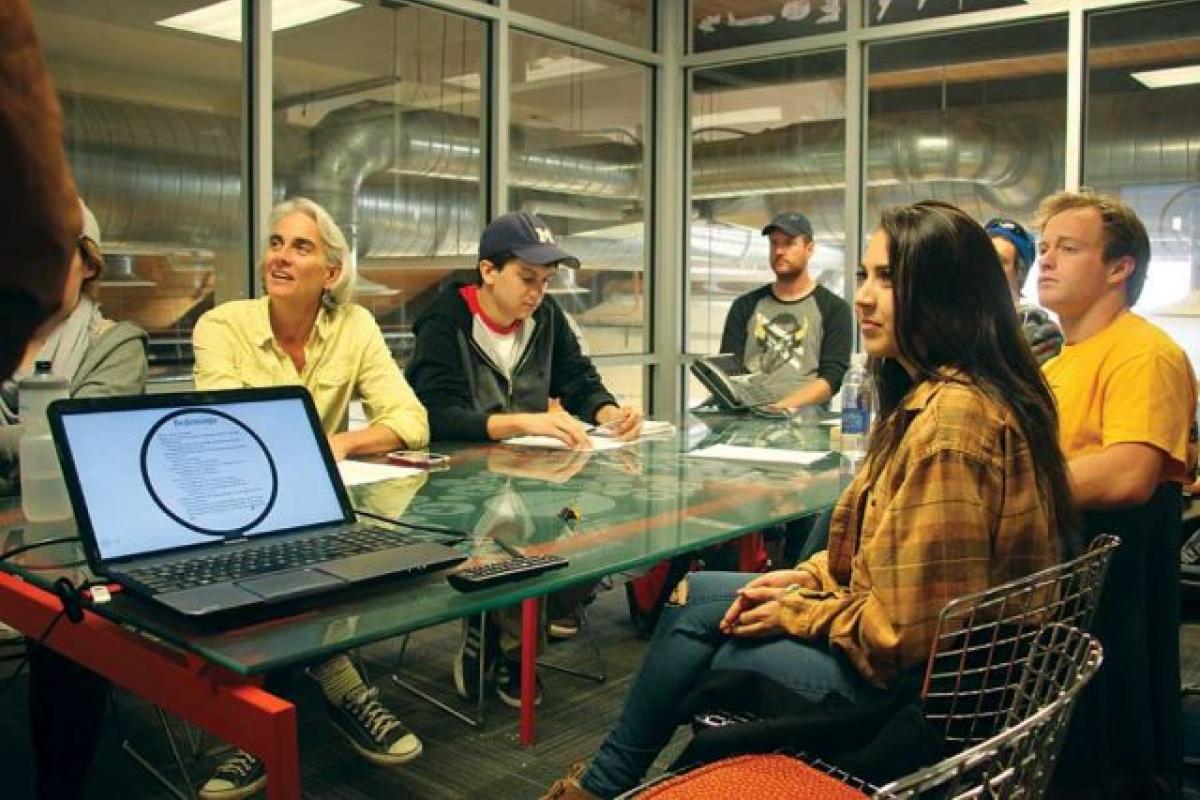 Martha Rosso leading students
