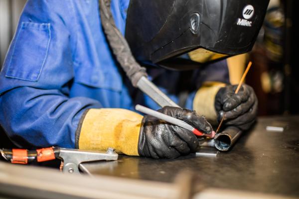 person welding