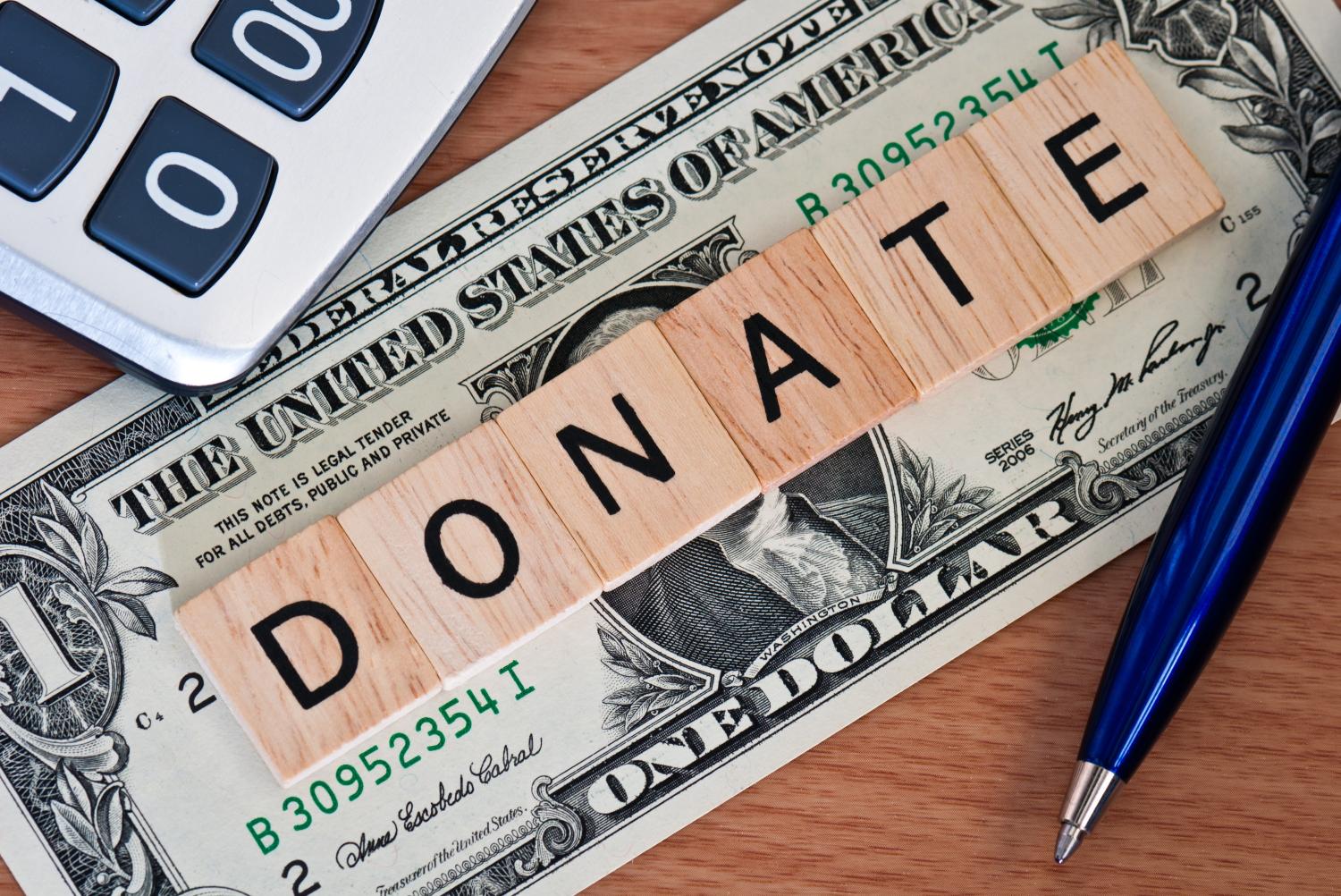donate letters on top of money