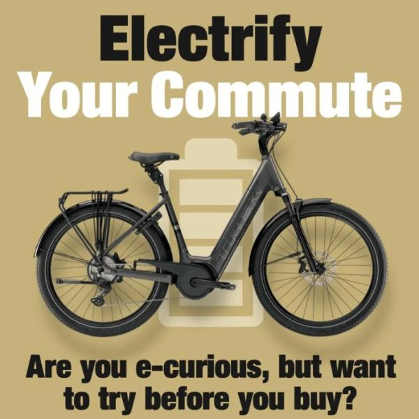 Picture of an E bike with the words "Electrify your commute. Are you e-curious, but want to try before you buy?"