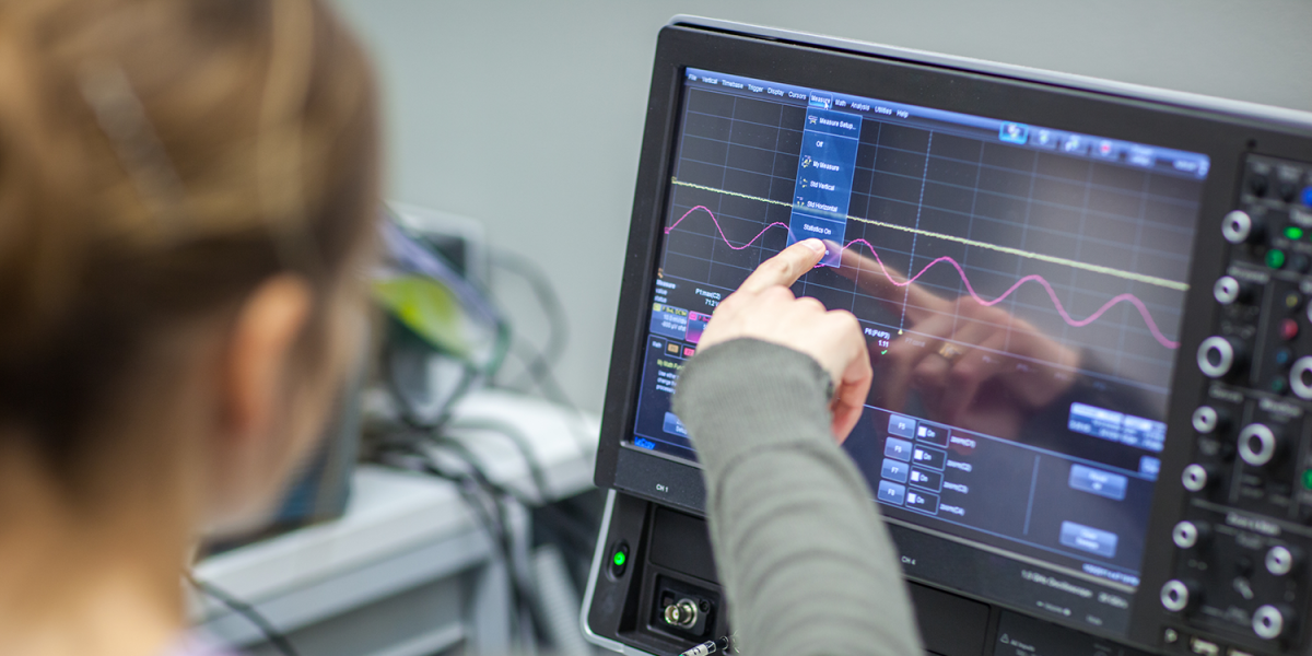 Female scientist doing research in a quantum optics lab