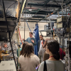 JILA researchers explain their laboratory set up, headed by JILA Fellow and CU Boulder Physics professor Heather Lewandowski, as part of a laboratory tour during the CU*IP Boulder 2025 conference