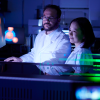 CU researchers working in a drug discovery lab
