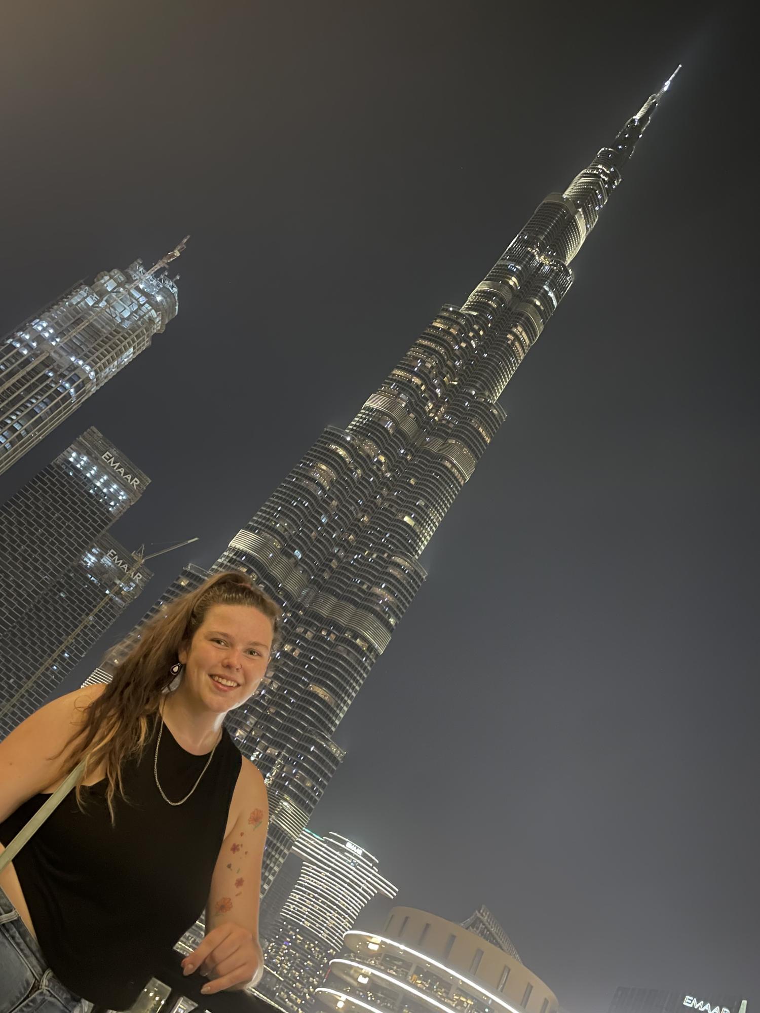 Molly standing in front of the Burj Khalifa in Dubai