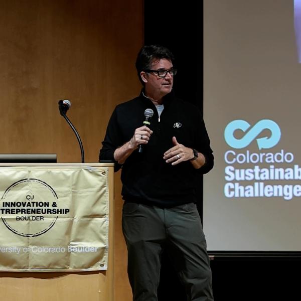 CU Boulder's Vice Chancellor for Sustainability Andrew Mayock addressing participants at the 2025 Colorado Sustainability Challenge