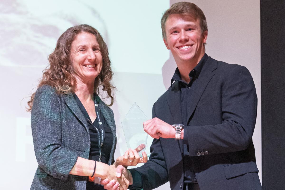 Mara Rose receives the 2025 Entrepreneurial Award from Harris Cunningham