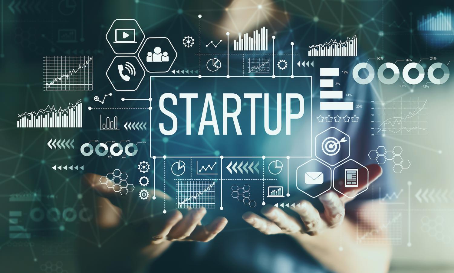 Image of person's hands and startup icons