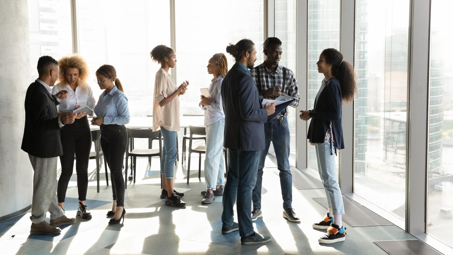 People networking in an office