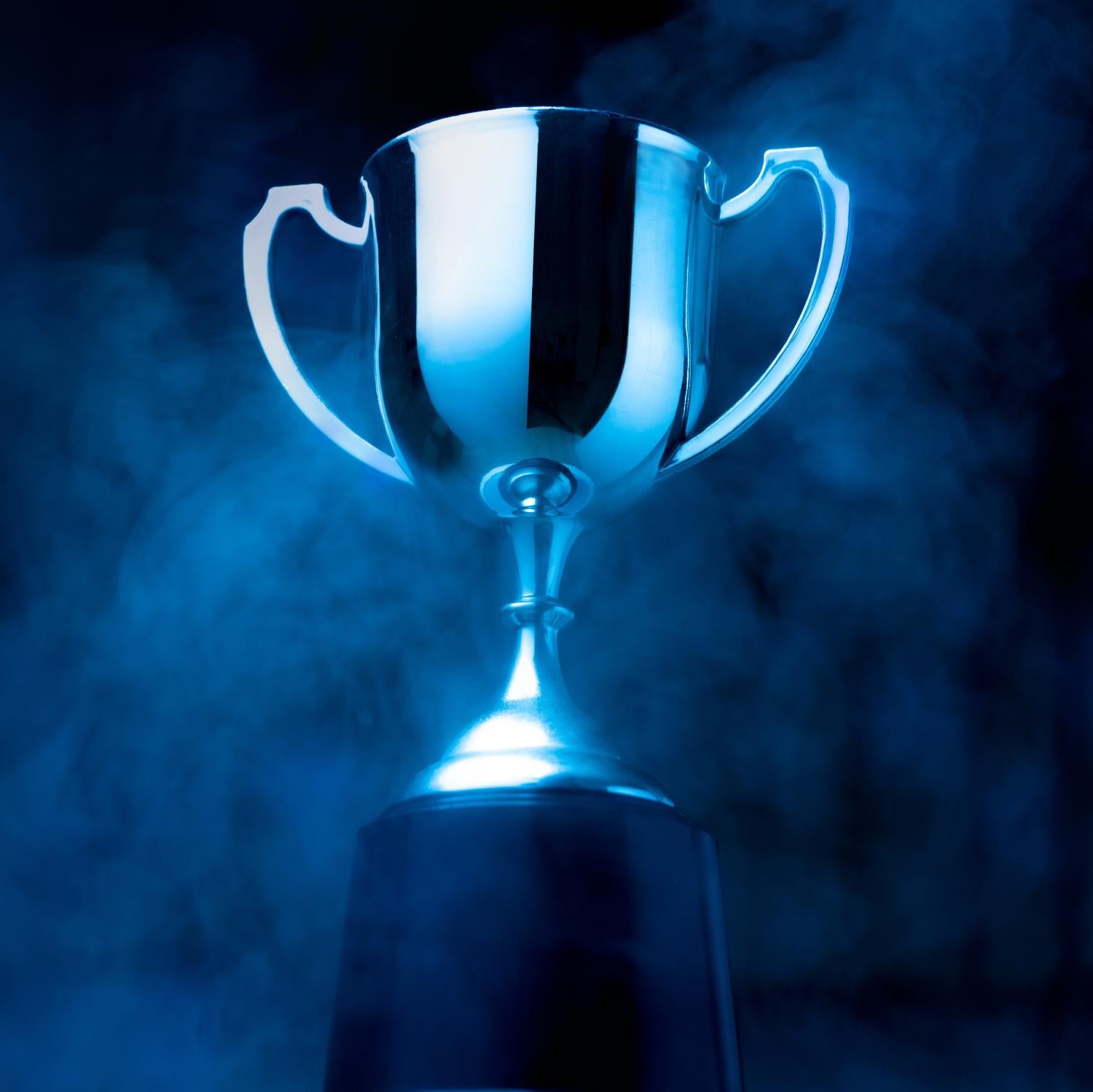 Trophy on a blue stand and background