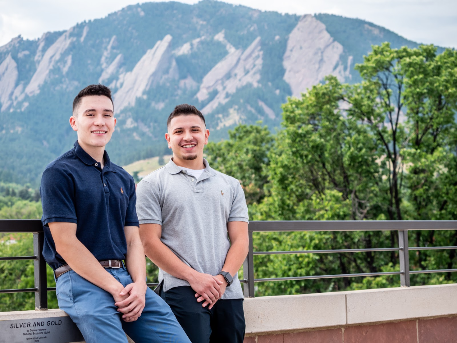 david villalobos and david lopez in front of flatirons