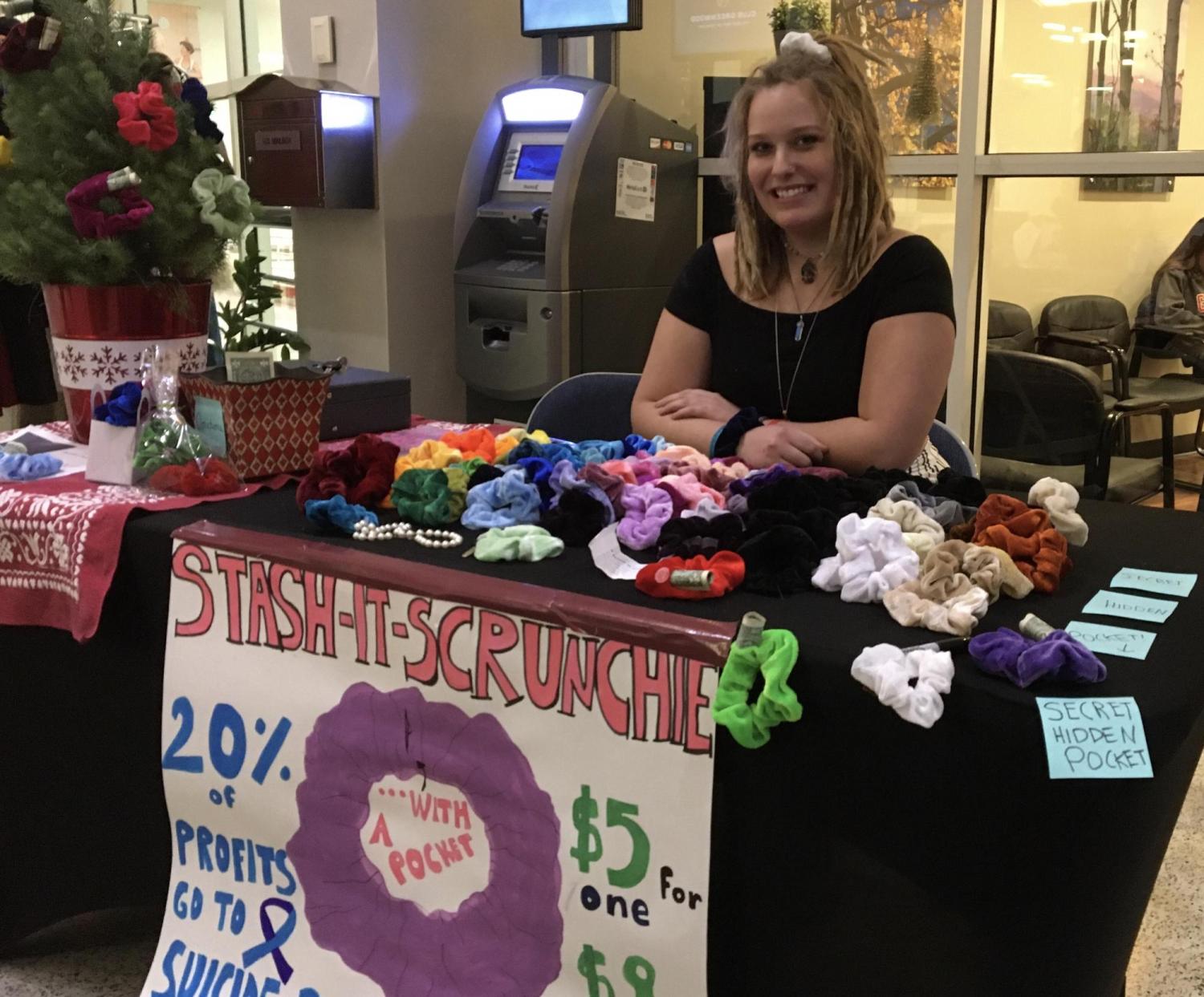 maddie freeman with stash-it scrunchie booth