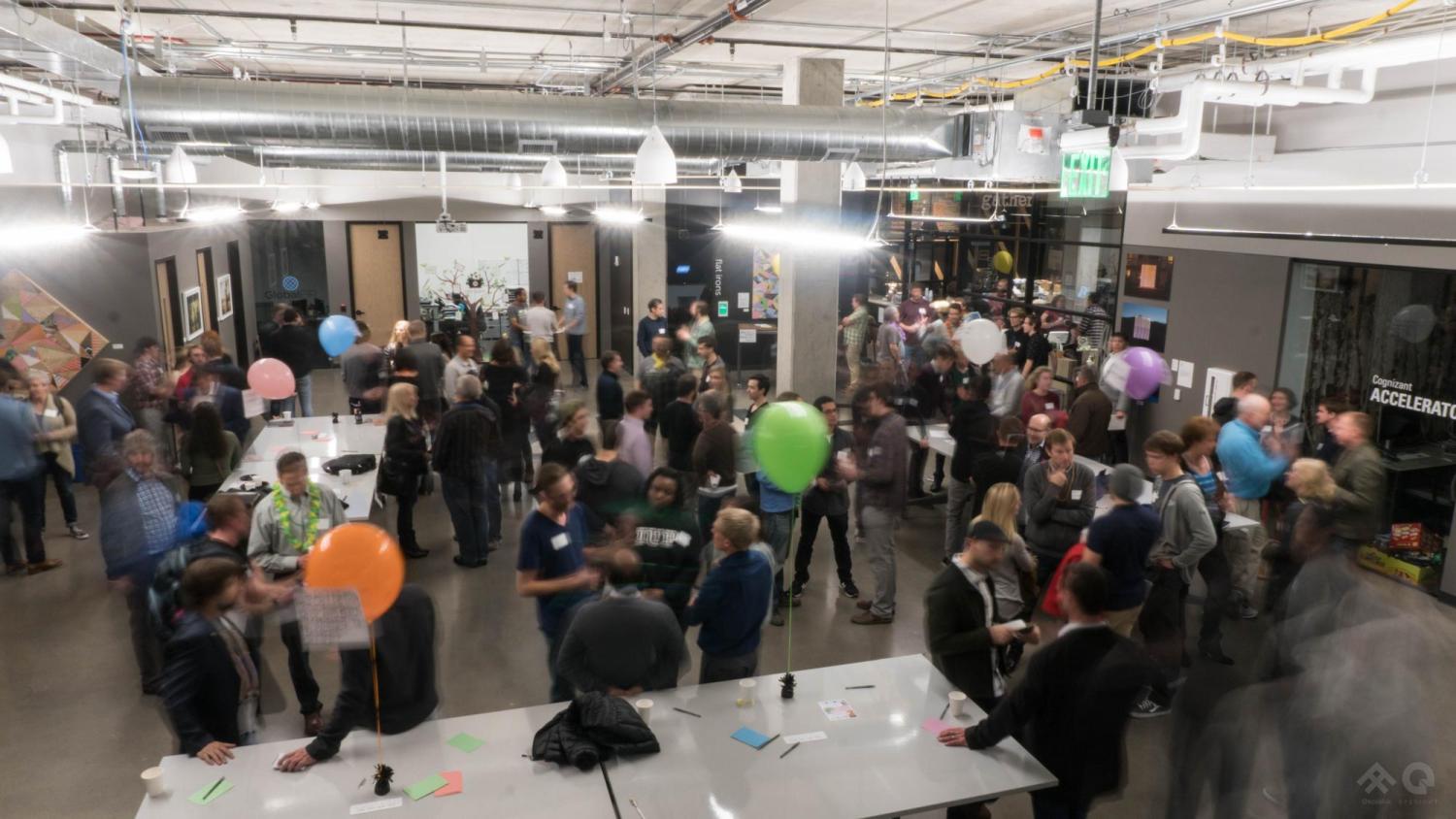 A large group of mentors and New venture challenge teams network