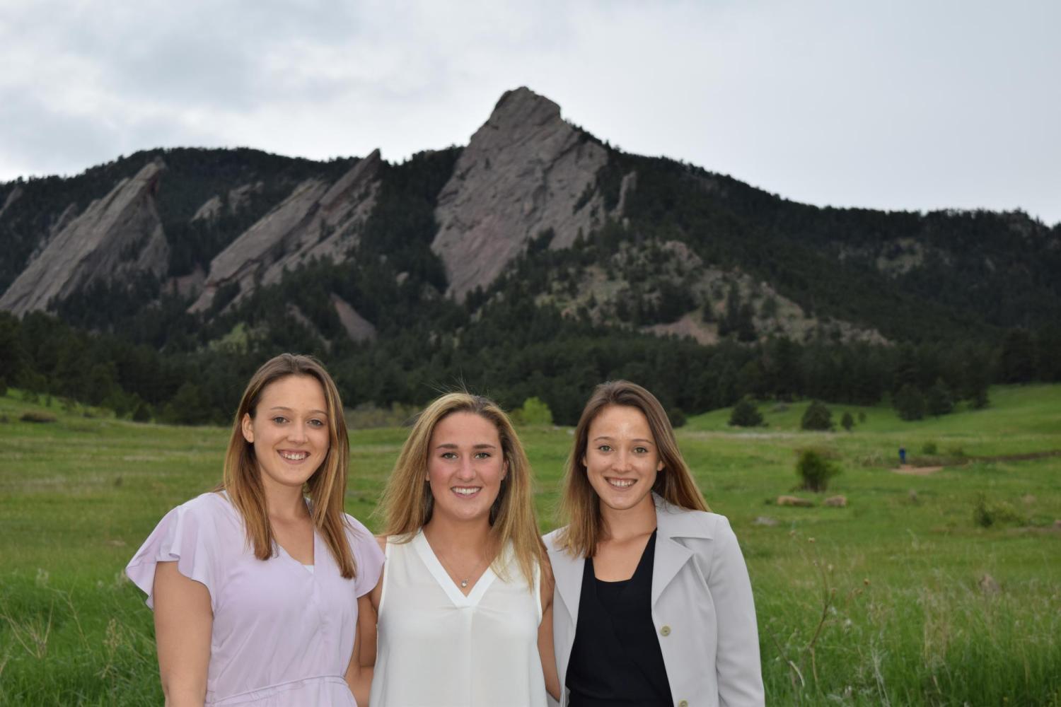 trio care team in front of flatirons