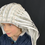 Helmet of sensors worn by a child