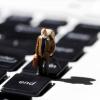 toy man on keyboard