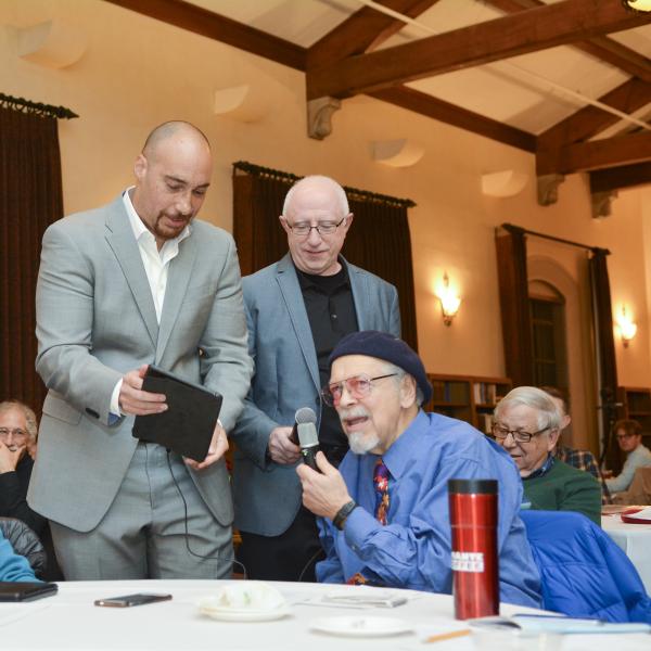 Symposium participants try their hand at rapping for social justice.