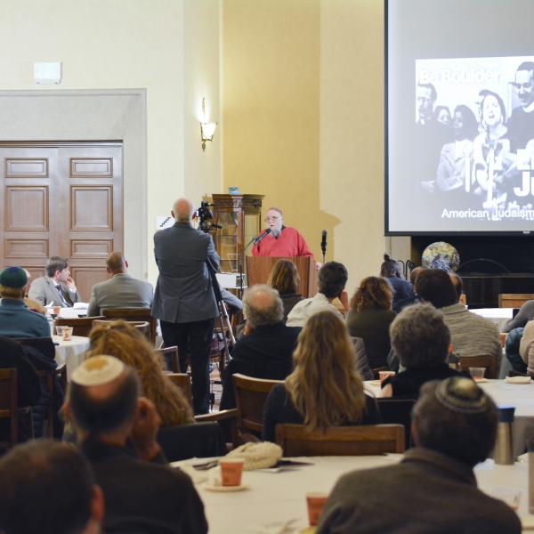 Participants watching the closing of the symposium.