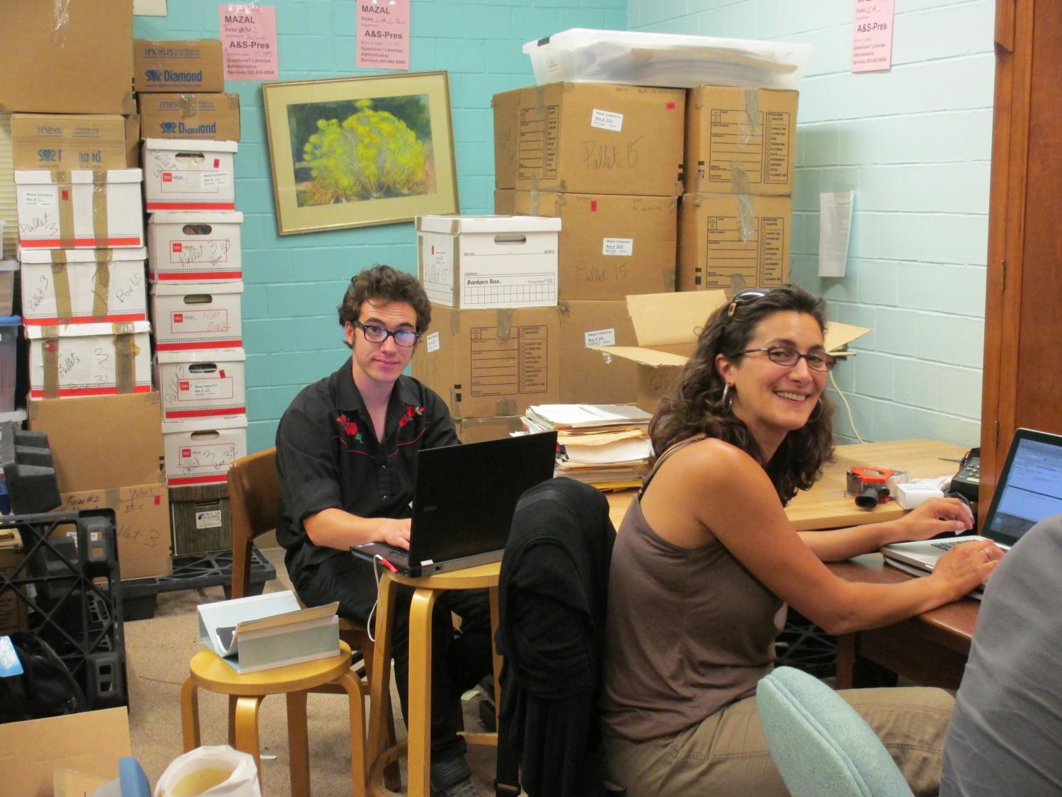 Students Sarah Gavison and Eli Boonen-Vail pictured working the summer inventory