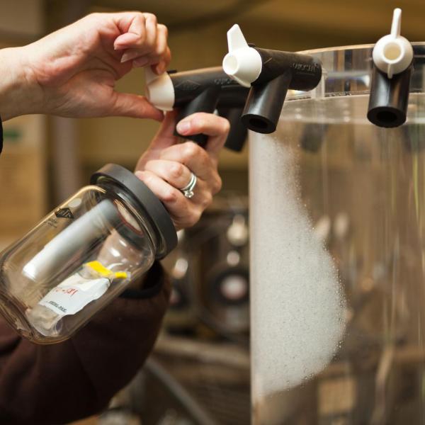 Wendy Roth works to freeze dry a sediment sample